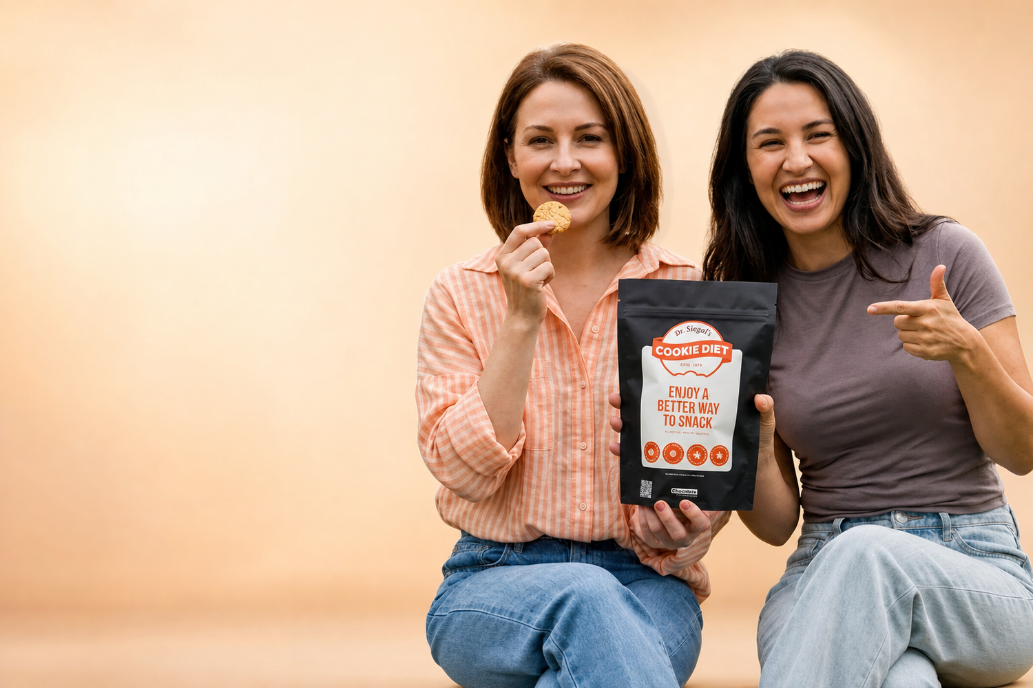 Two women enjoying Dr. Siegal’s Cookie Diet cookies